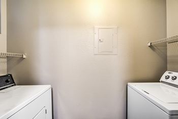 Madison at Black Mountain apartments in Henderson, NV 89015 photo of a room with a washer and a dryer